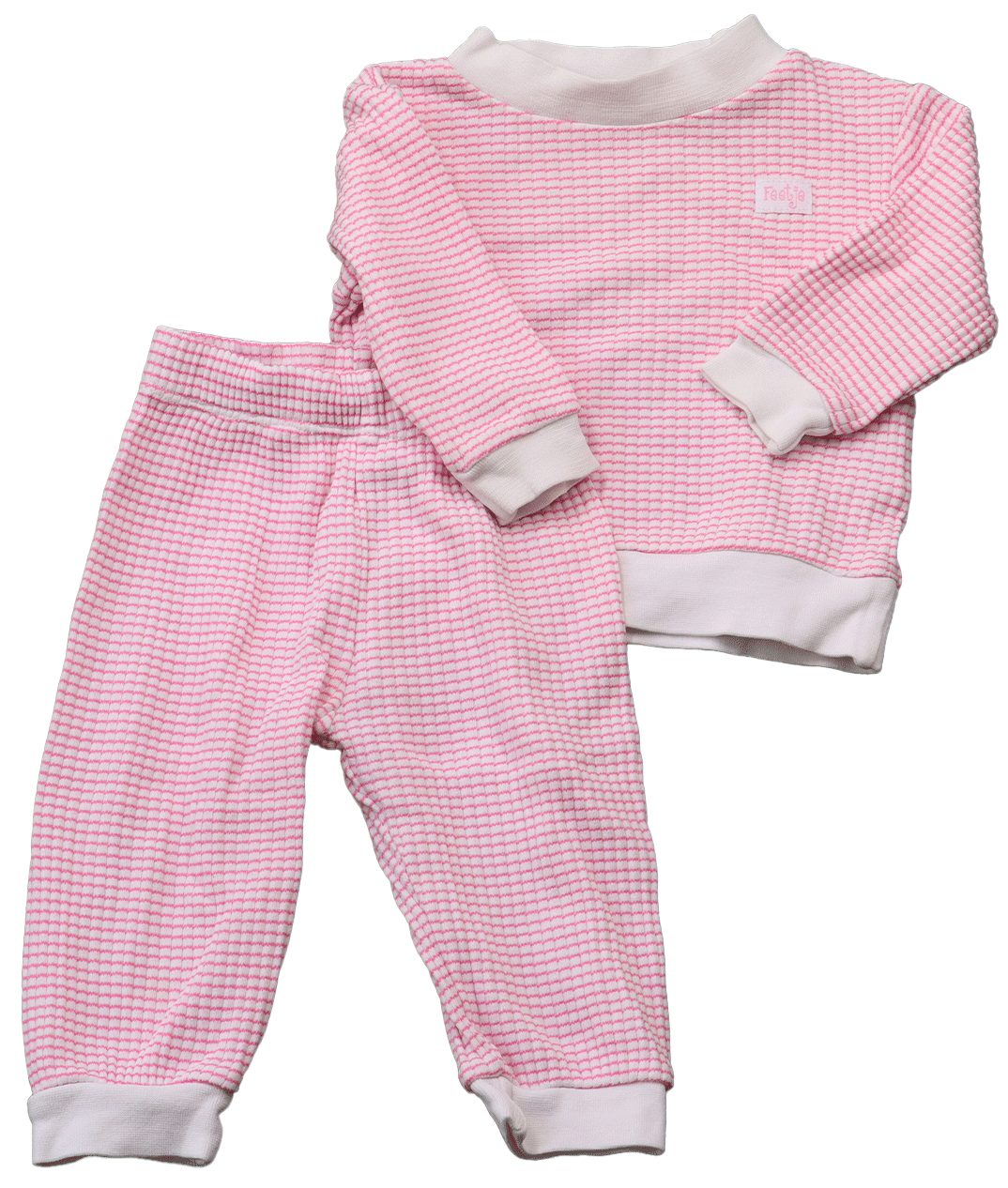 Feetje pyjama wit-roze in maat 62. De moderne en gewilde wafel pyjama heeft een frisse witte kleur met een fel roze motief.